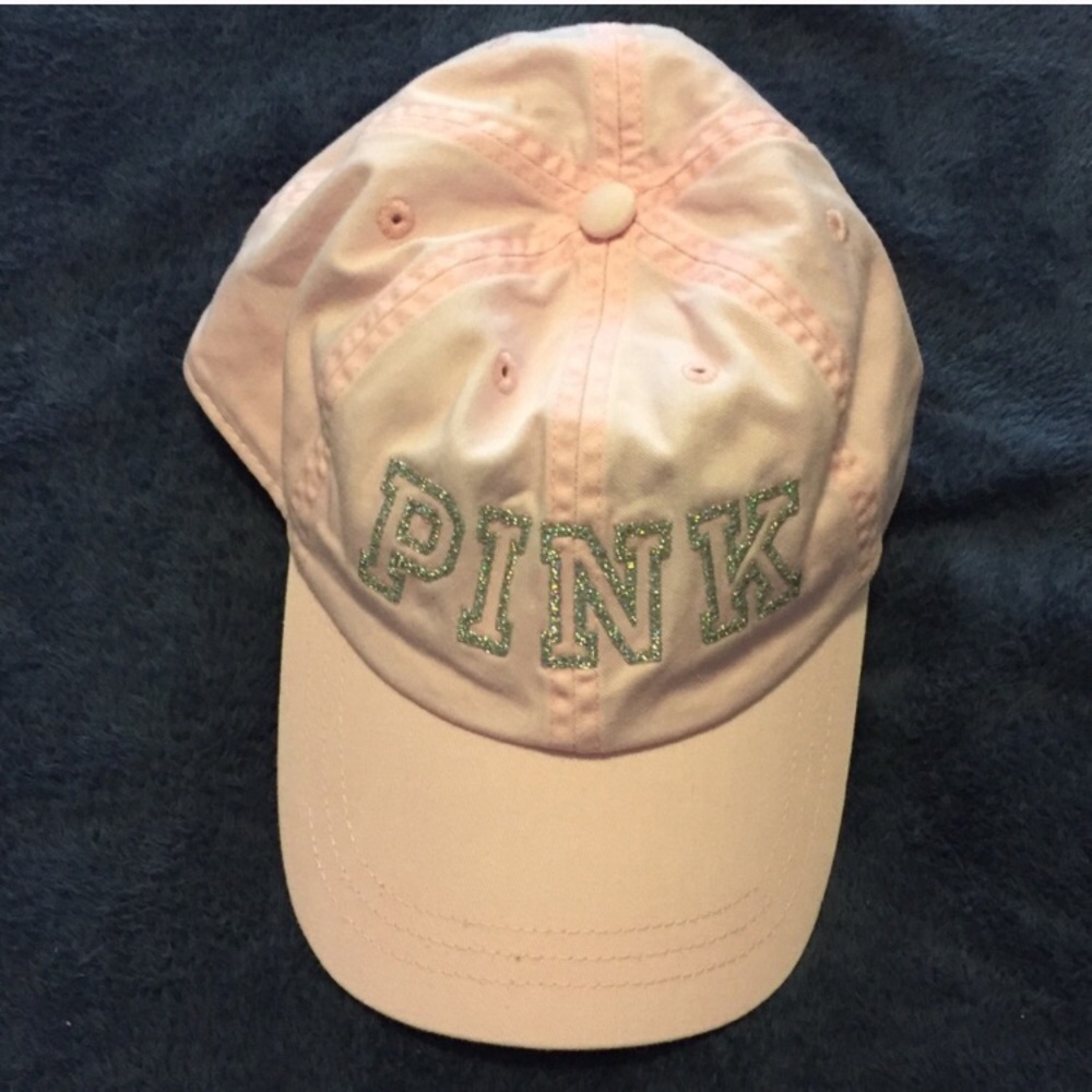 Pink vs baseball cap